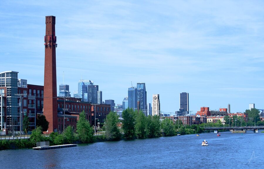Lachine Canal in Montreal with the Farine Five Roses smokestack and downtown skyline