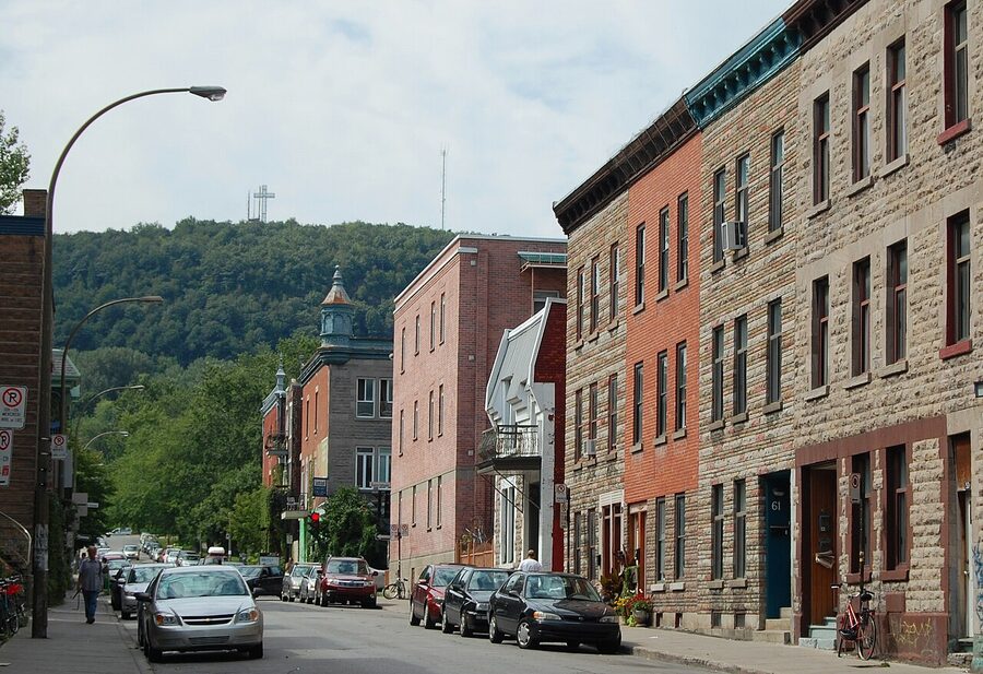 Plateau-Mont-Royal street in Montreal with Mont Royal visible behind the rooflines