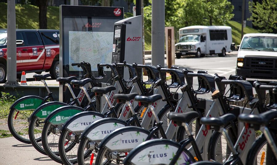 A row of BIXI bike sharing bicycles docked at a station in Montreal