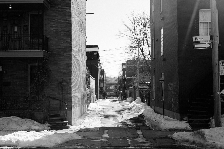Snow covered residential houses on rue Fabre in Montreal Plateau in winter