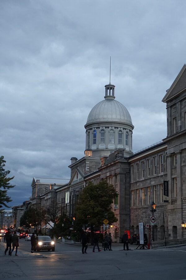 Marché Bonsecours silver dome rising above the rooftops at dusk